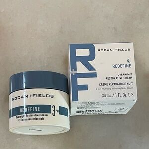 Rodan + Fields Redefine Cream with Blue and White Design
